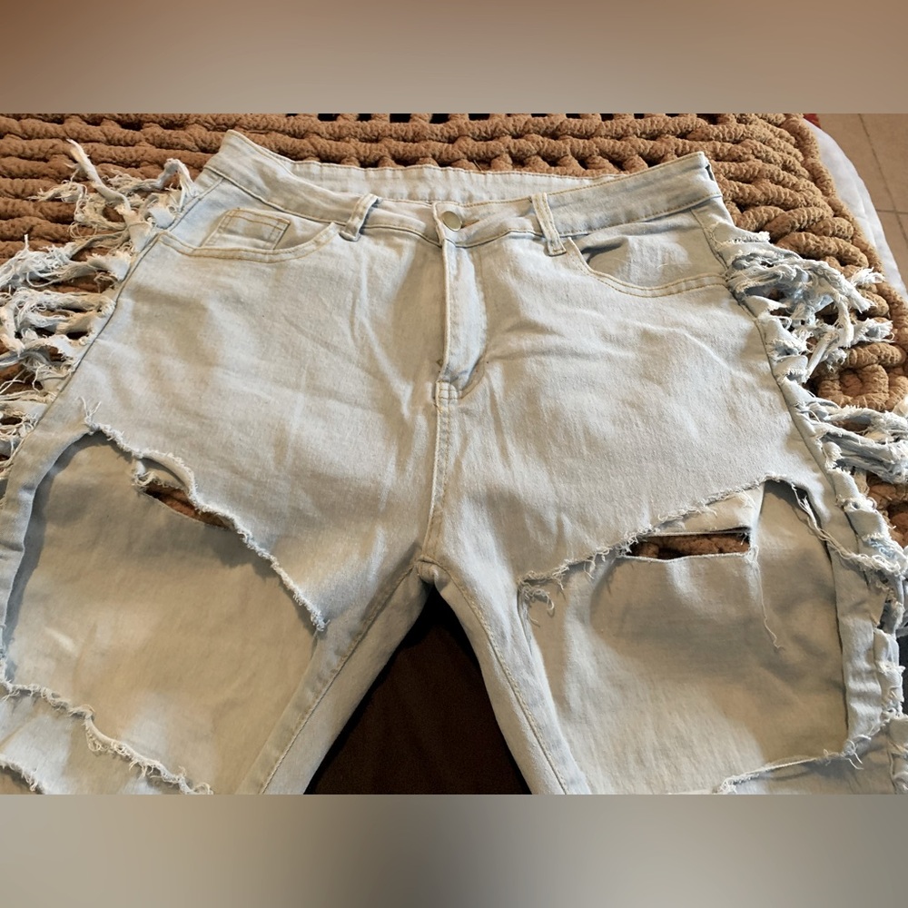 Distressed Light Blue Denim jeans